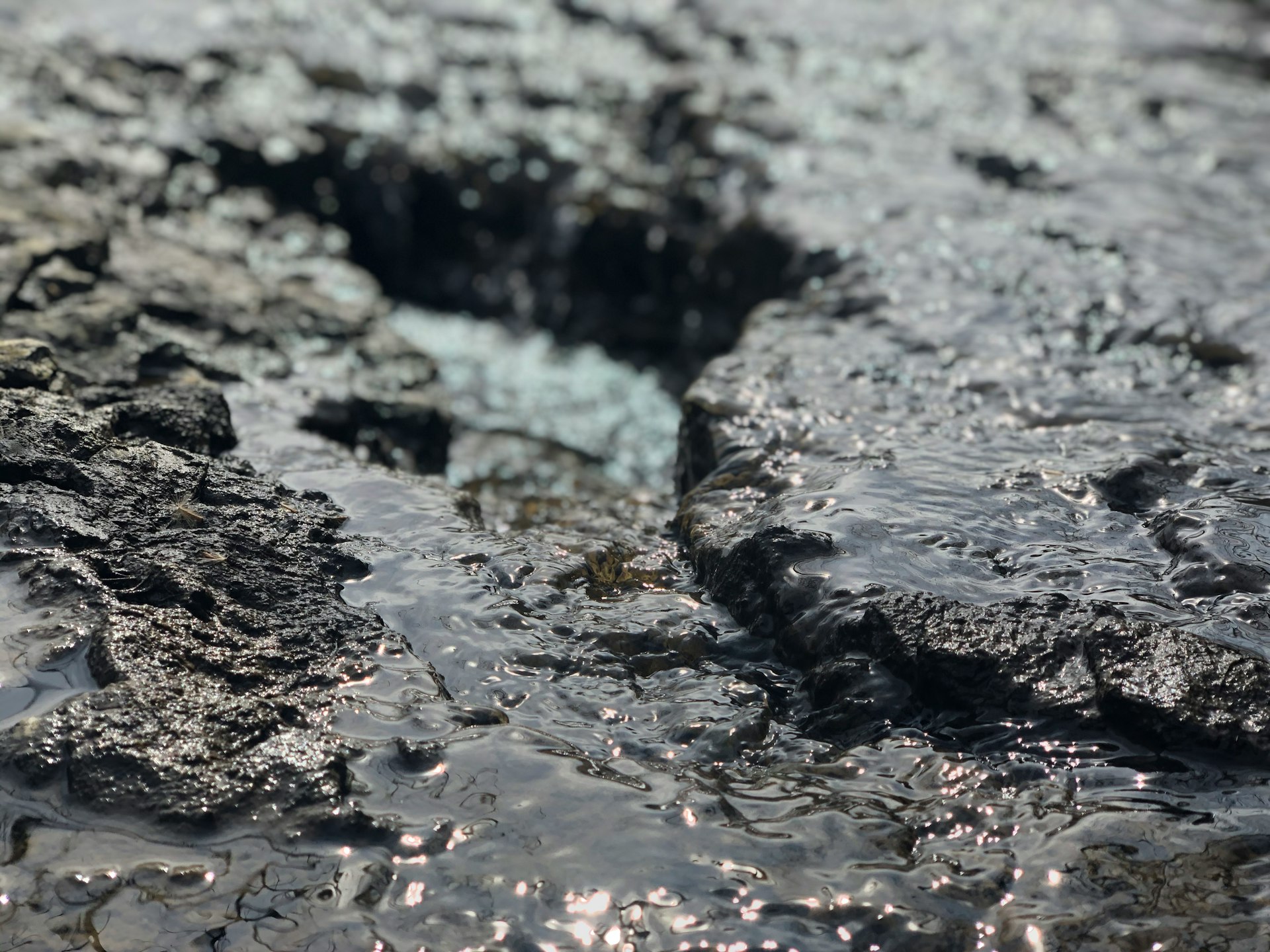 water splash on black rock